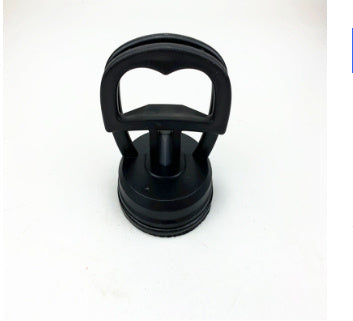 Black metal object on a white background