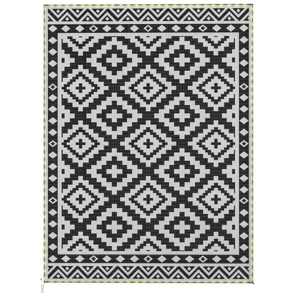Square outdoor rug with black and white repeating geometric diamond pattern