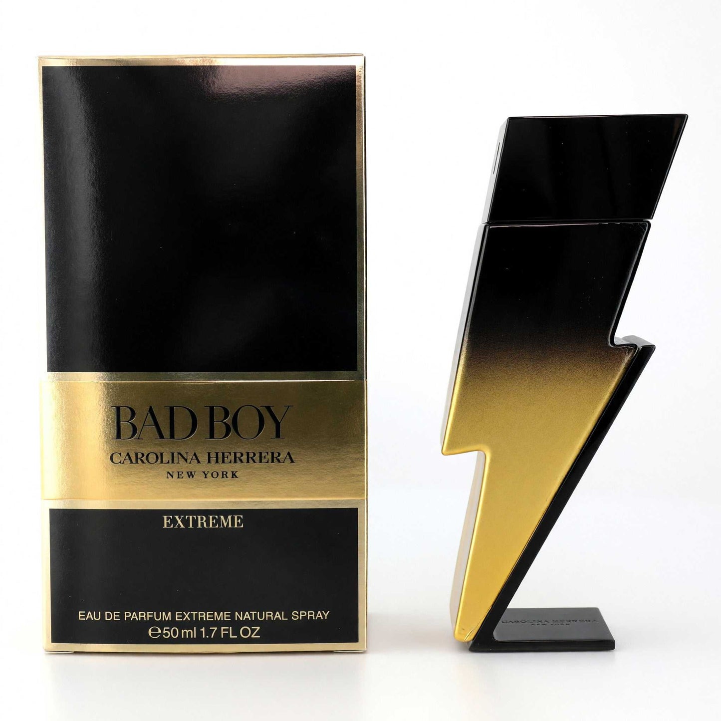 Men's eau de parfum spray set: black bottle with gold accents and boxed 'BAD BOY'.