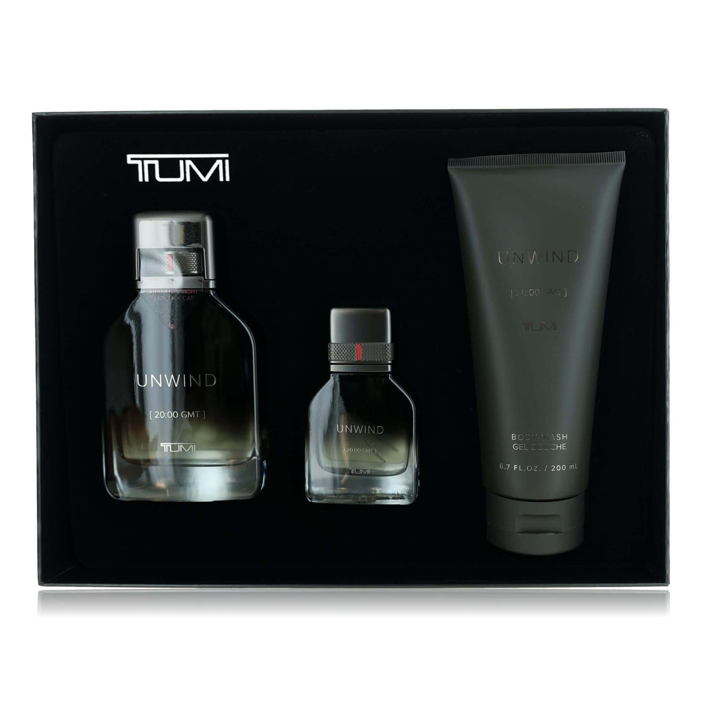 Tumi Unwind 3-piece men’s gift set with two dark bottles and a lotion tube