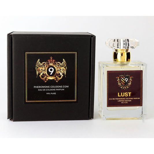 Men's cologne bottle with clear glass body, gold cap, and dark gift box
