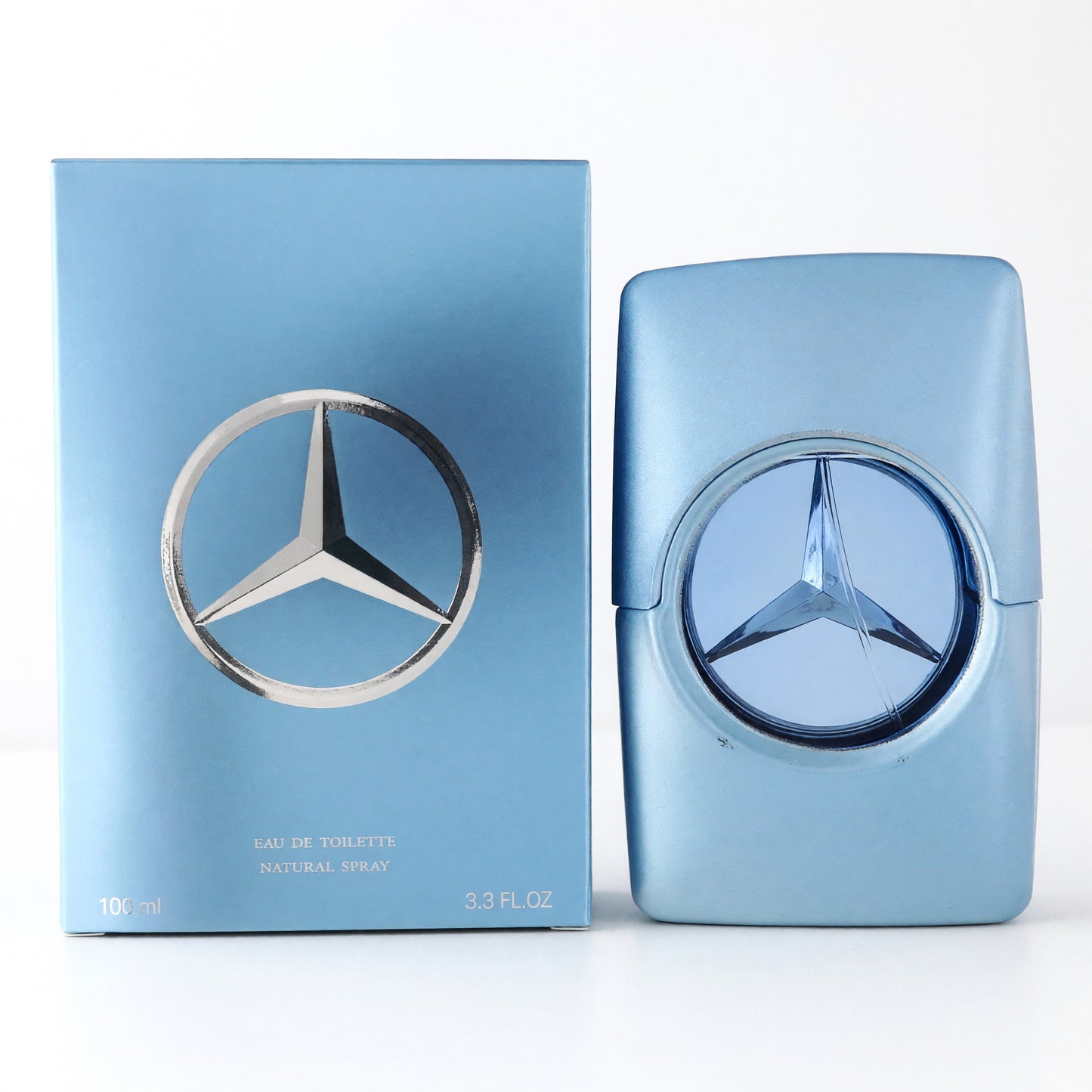 Men's eau de toilette spray set: blue box and bottle with Mercedes-Benz logo.