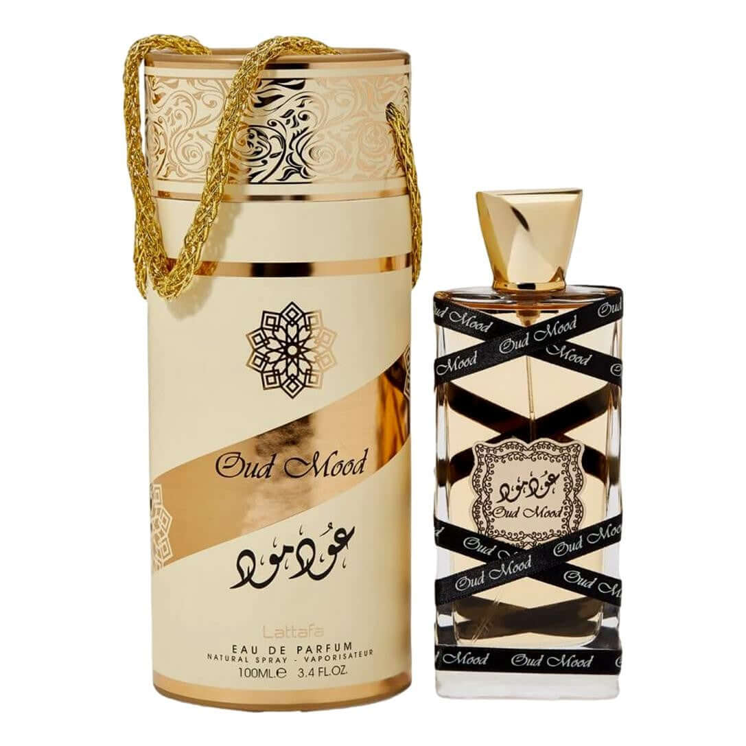 Oud Mood by Lattafa, 3.4 oz EDP Spray for Unisex in elegant packaging with gold accents.