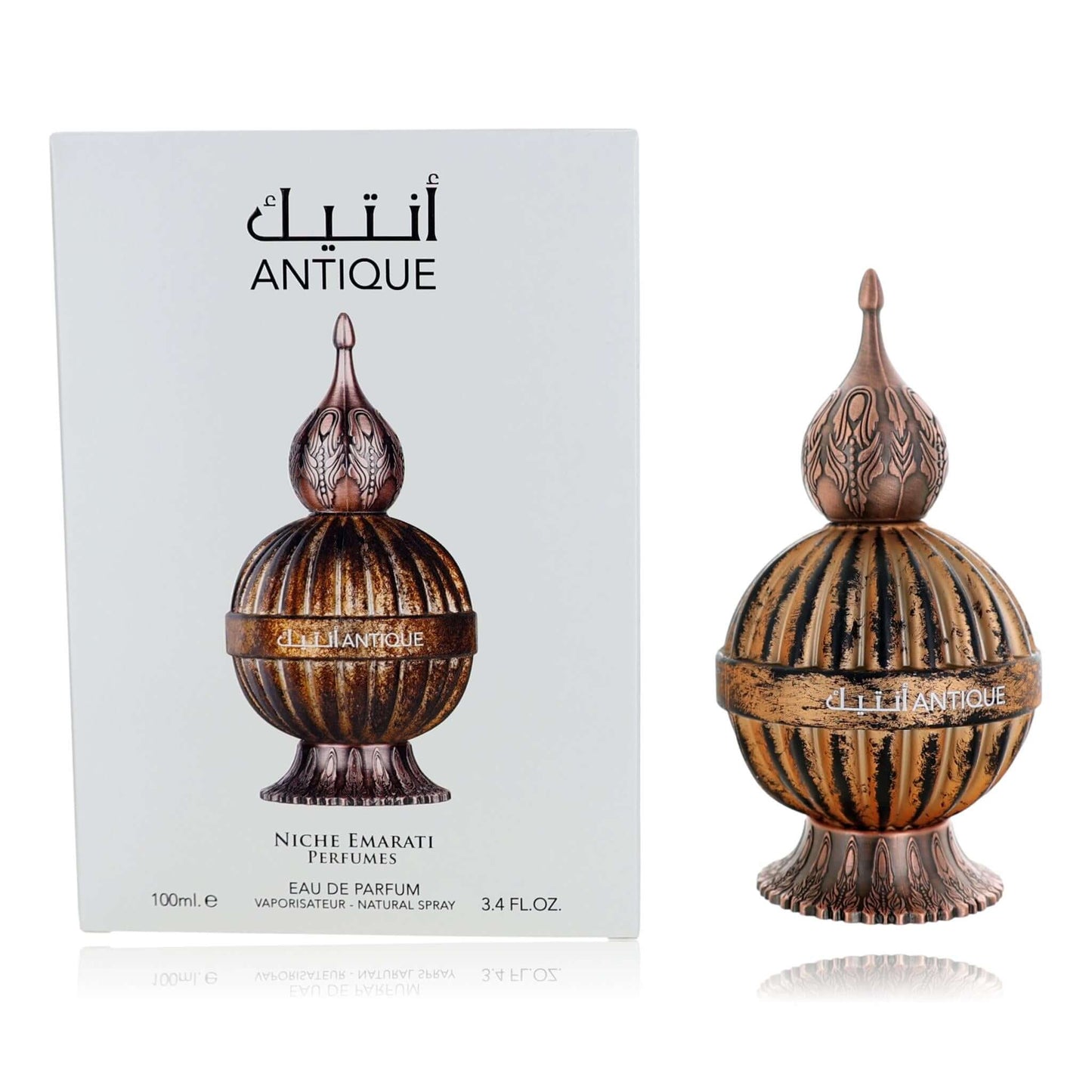 Perfume set box and decorative bottle with ornate finial, brown and gold detailing