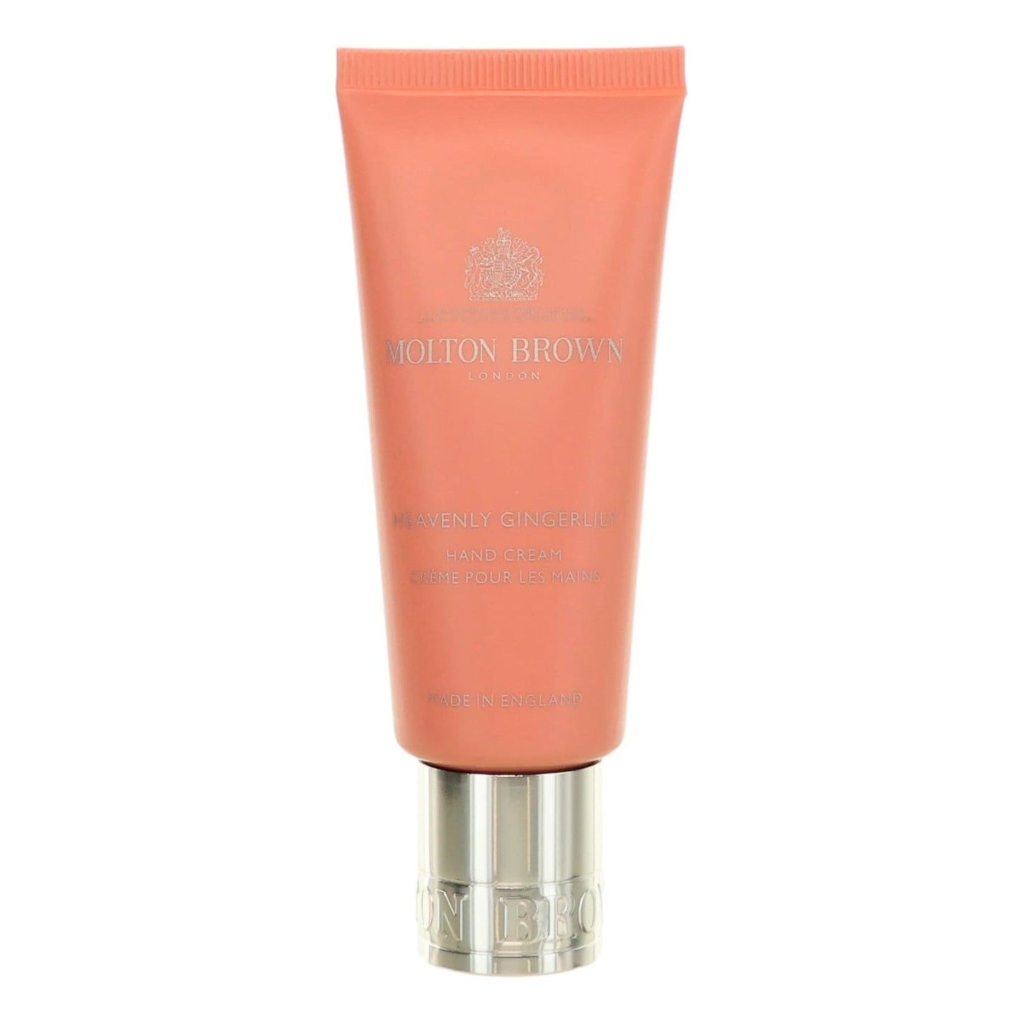 Molton Brown Heavenly Gingerlily hand cream tube, coral pink with silver cap