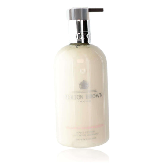 Delicious Rhubarb and Rose by Molton Brown, 10oz Hand Lotion for Unisex in a pump bottle.
