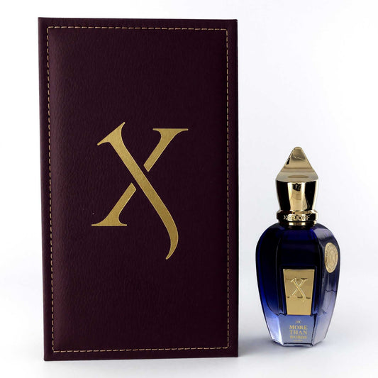 Unisex eau de parfum spray bottle with dark blue glass and presentation box