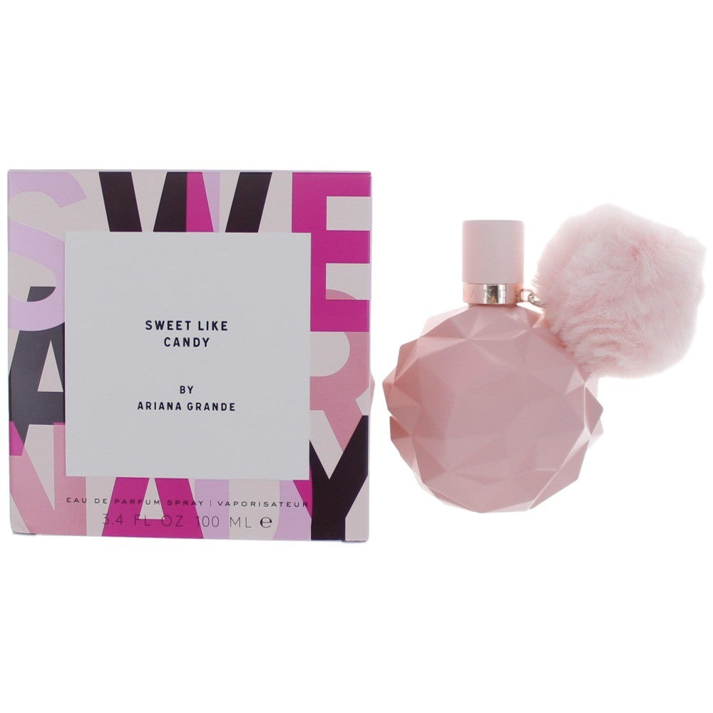 Sweet Like Candy perfume bottle with pink geometric glass and fuzzy pom on sprayer