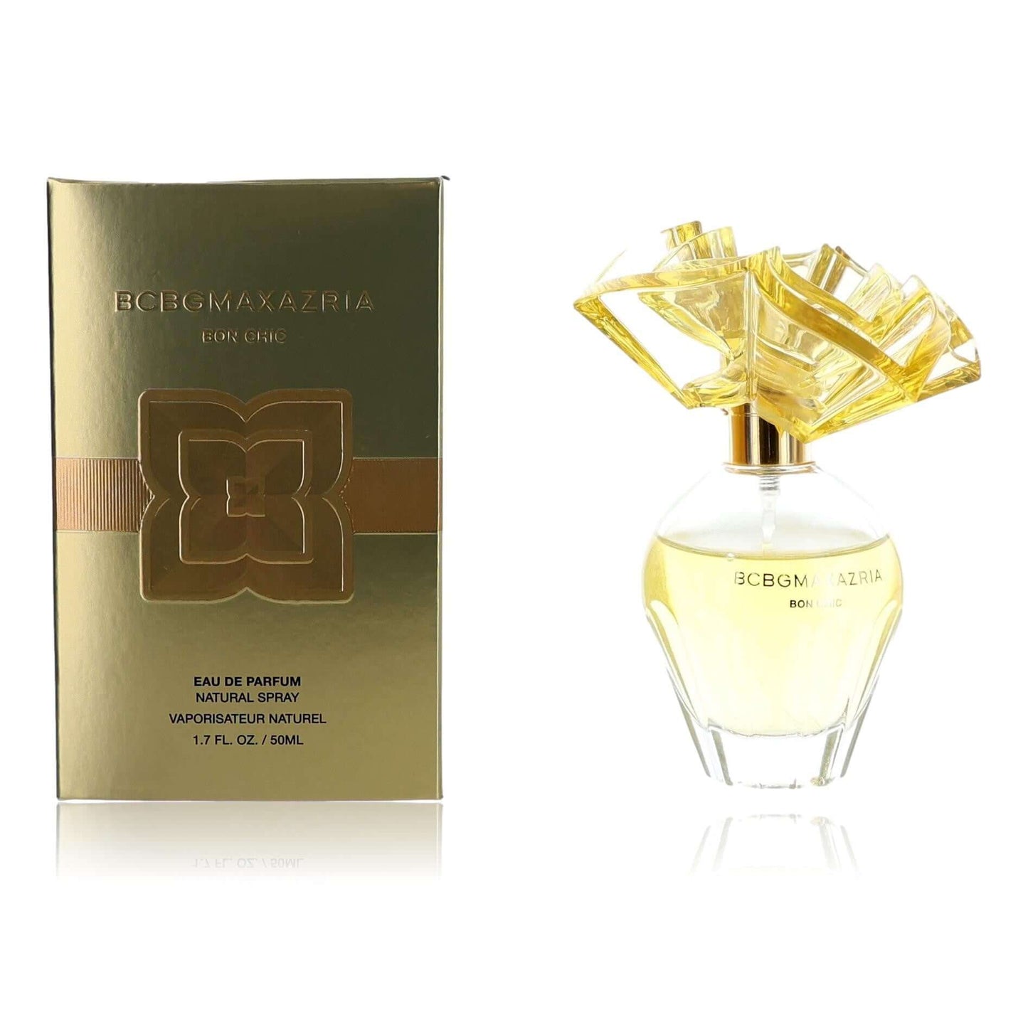 BCBGMAXAZRIA Bon Chic EDP spray set: gold-toned box and clear glass perfume bottle