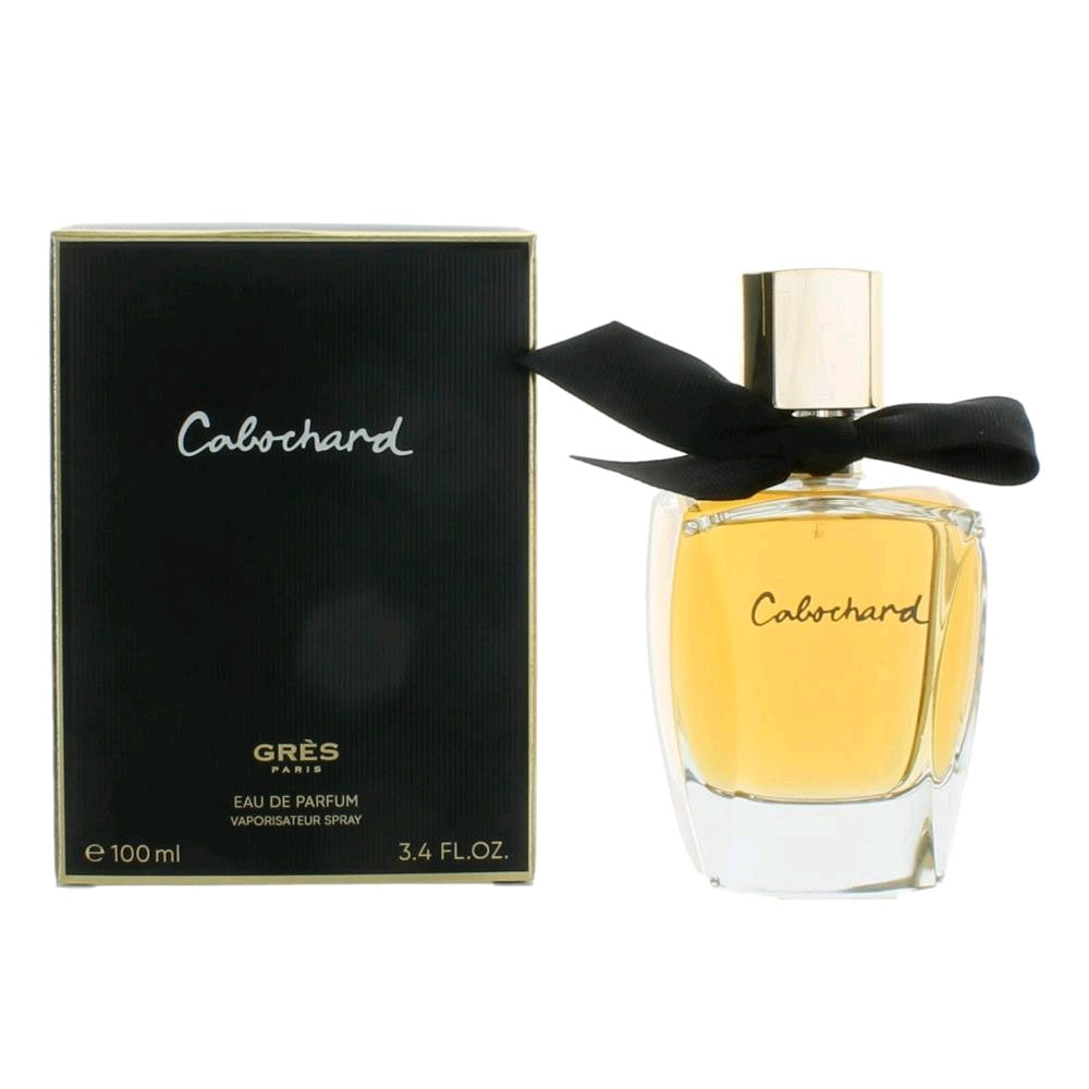Women's eau de parfum spray bottle with black bow and matching box