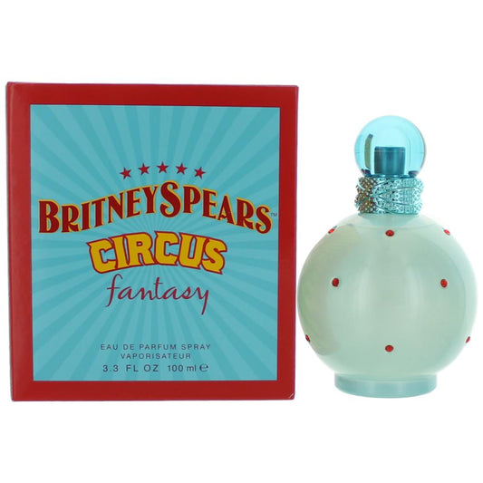 Women’s eau de parfum spray bottle with light blue cap and red dot accents