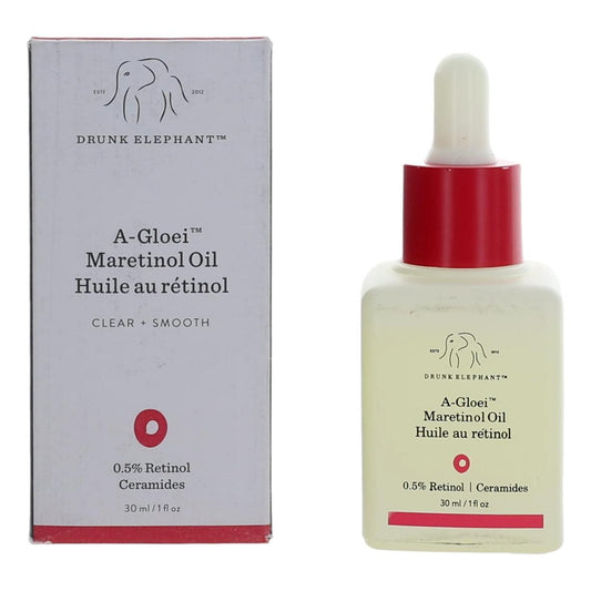 Retinol oil bottle with red dropper and product box, clear liquid