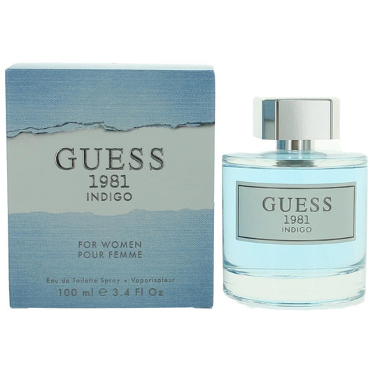 Women's Guess 1981 Indigo EDT spray bottle with matching box, glass and blue liquid