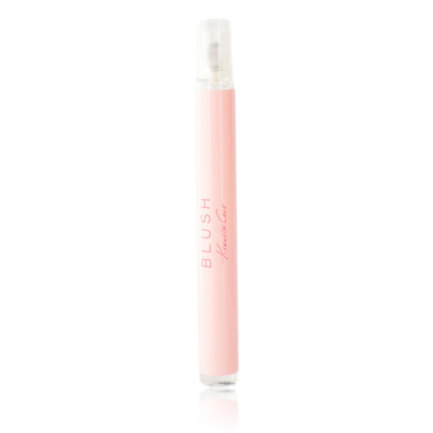 Women’s eau de parfum spray bottle in blush pink with clear cap and label