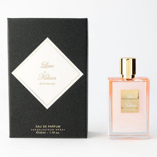 Kilian eau de parfum spray with clear pink bottle, gold cap, and black gift box