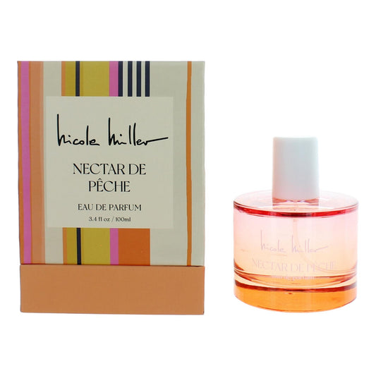 Eau de parfum spray bottle with peach-toned liquid and white cap, boxed set