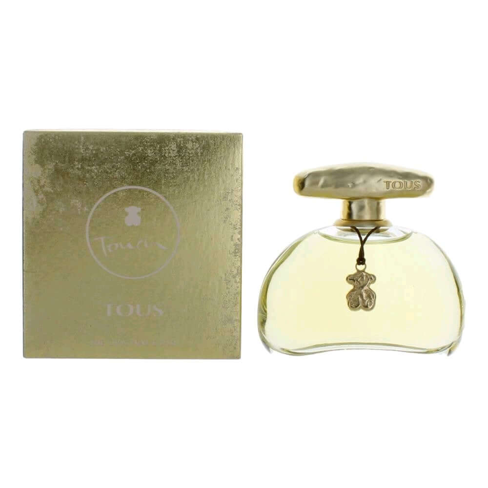 Women’s EDT spray perfume bottle with charm pendant, shown with matching green box
