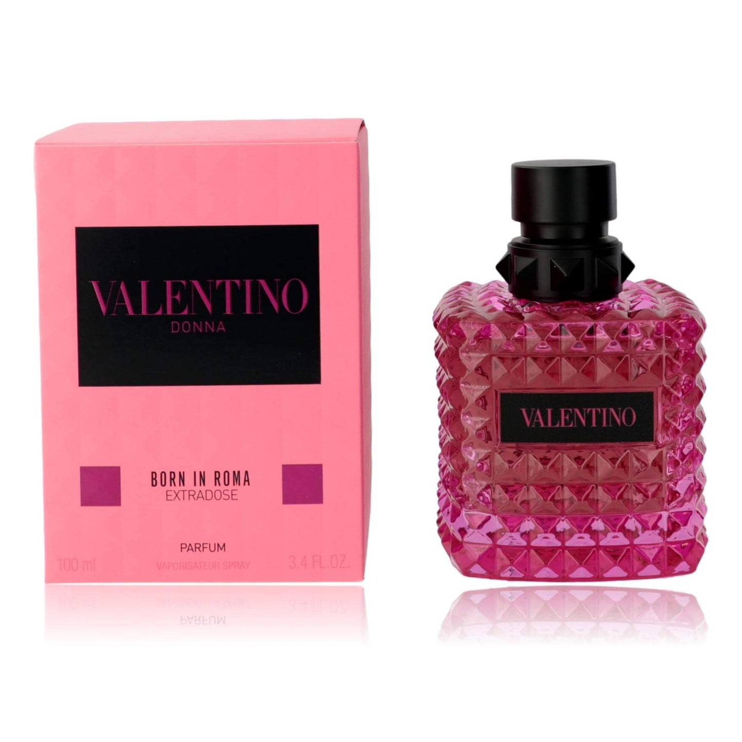 Pink faceted Valentino perfume spray bottle with black cap and matching box