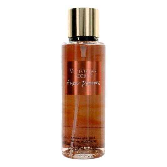 Amber Romance by Victoria's Secret, 8.4 oz Fragrance Mist for Women bottle with golden cap, showcasing its alluring scent.
