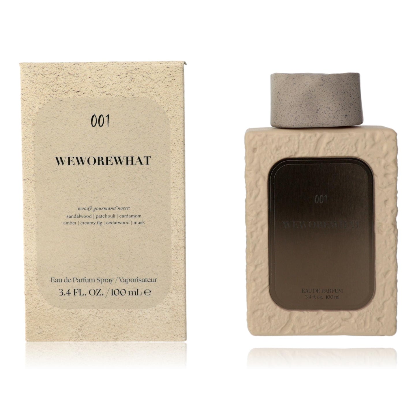 Women's EDP spray 001 by WEWOREWHAT, cream box and bottle with textured finish