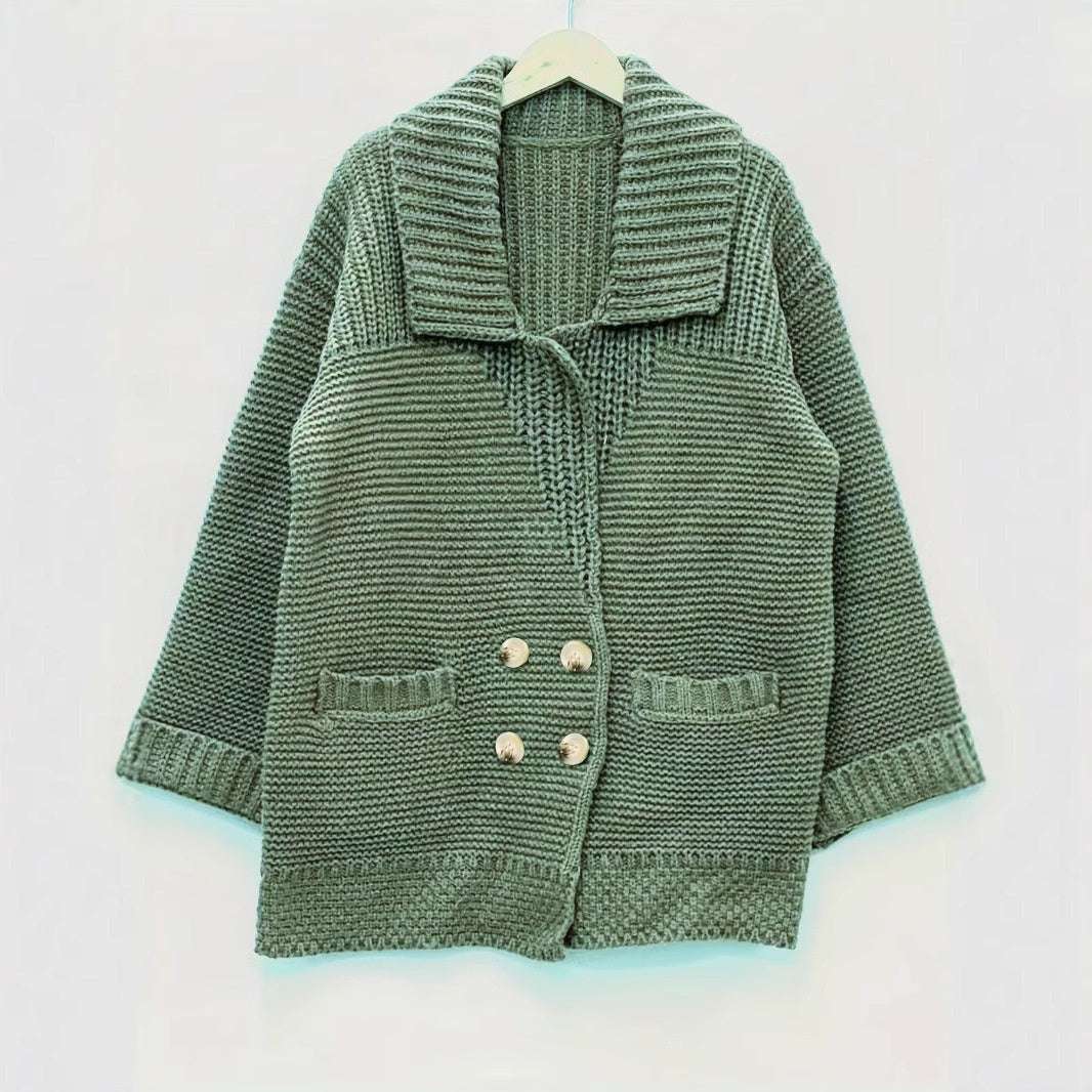 Green knitted cardigan on a white background