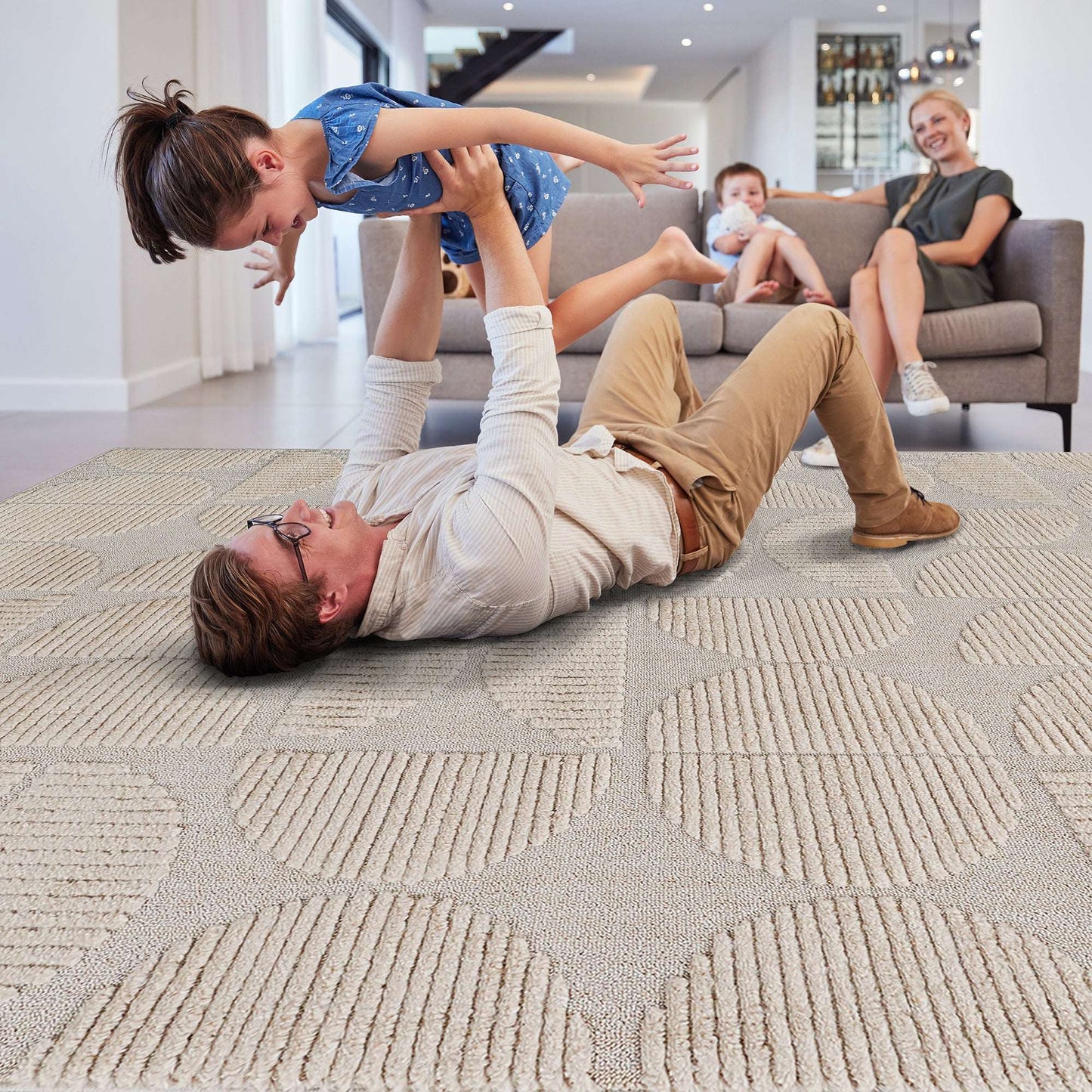 Beige geometric area rug with raised dot and block pattern
