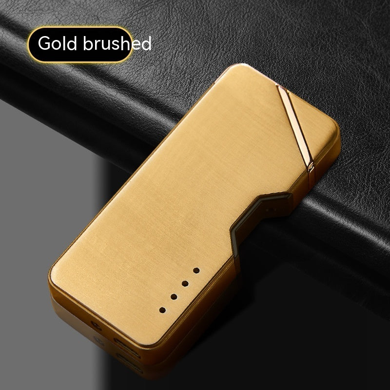 Gold brushed lighter on a black textured background
