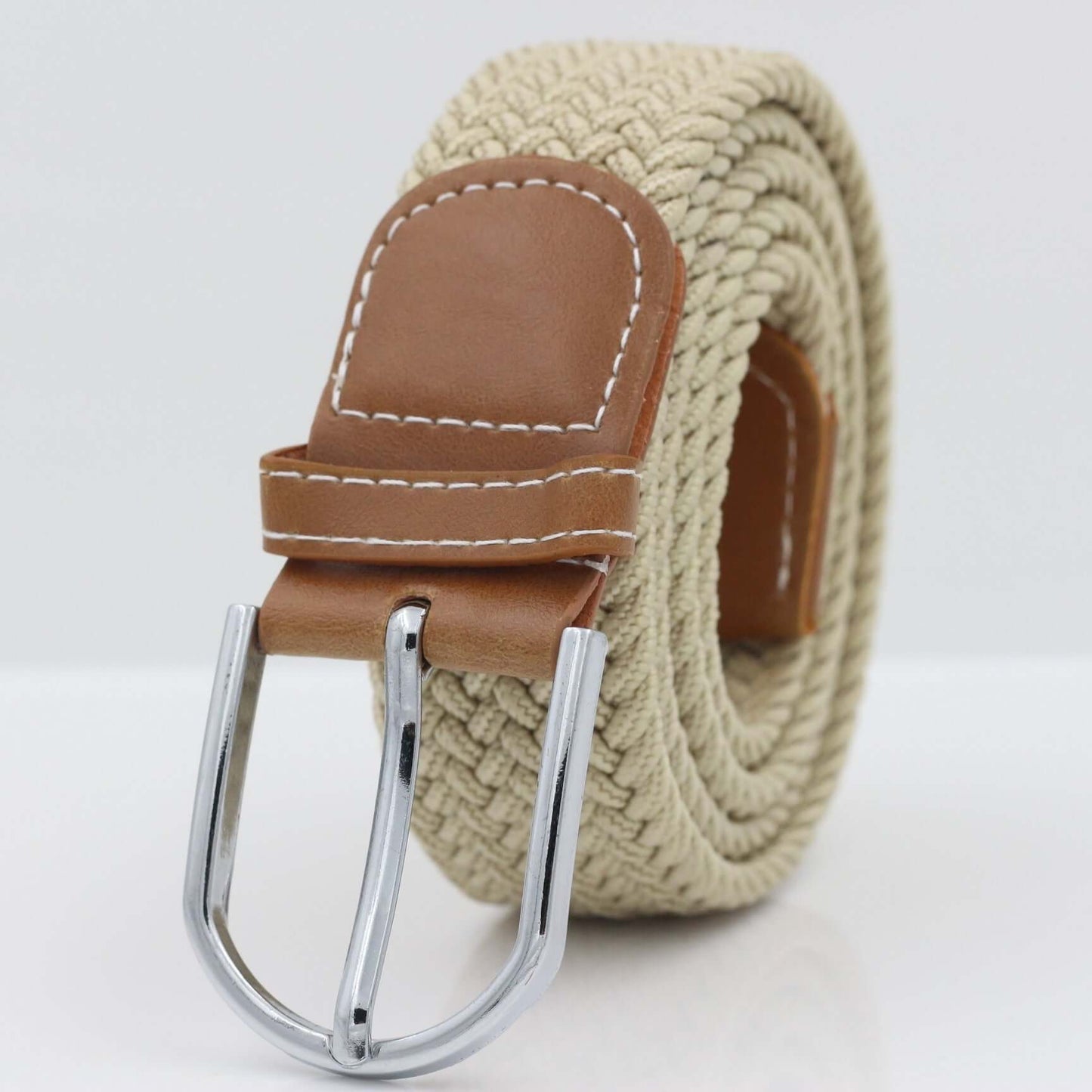 Simple Stretch And Breathable Canvas Woven Belt with tan leather buckle and cream woven fabric.