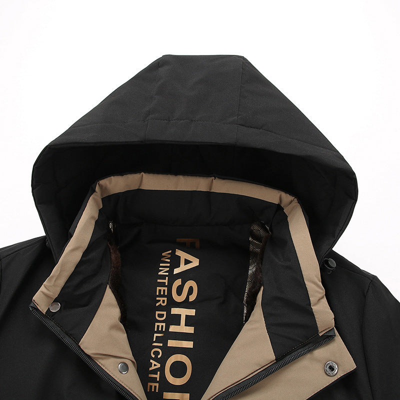 Close-up of a black and beige jacket with 'Fashion Winter Delicate' text on a white background