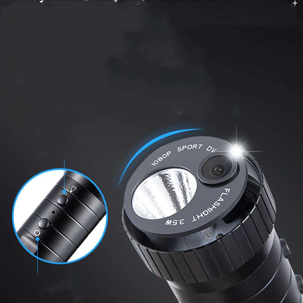 Black flashlight with camera lens on a dark background