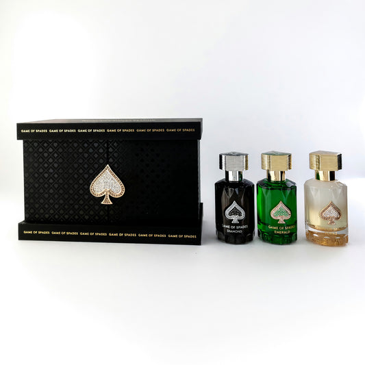 Unisex 3-piece perfume set with black gift box and three bottles, spade emblem