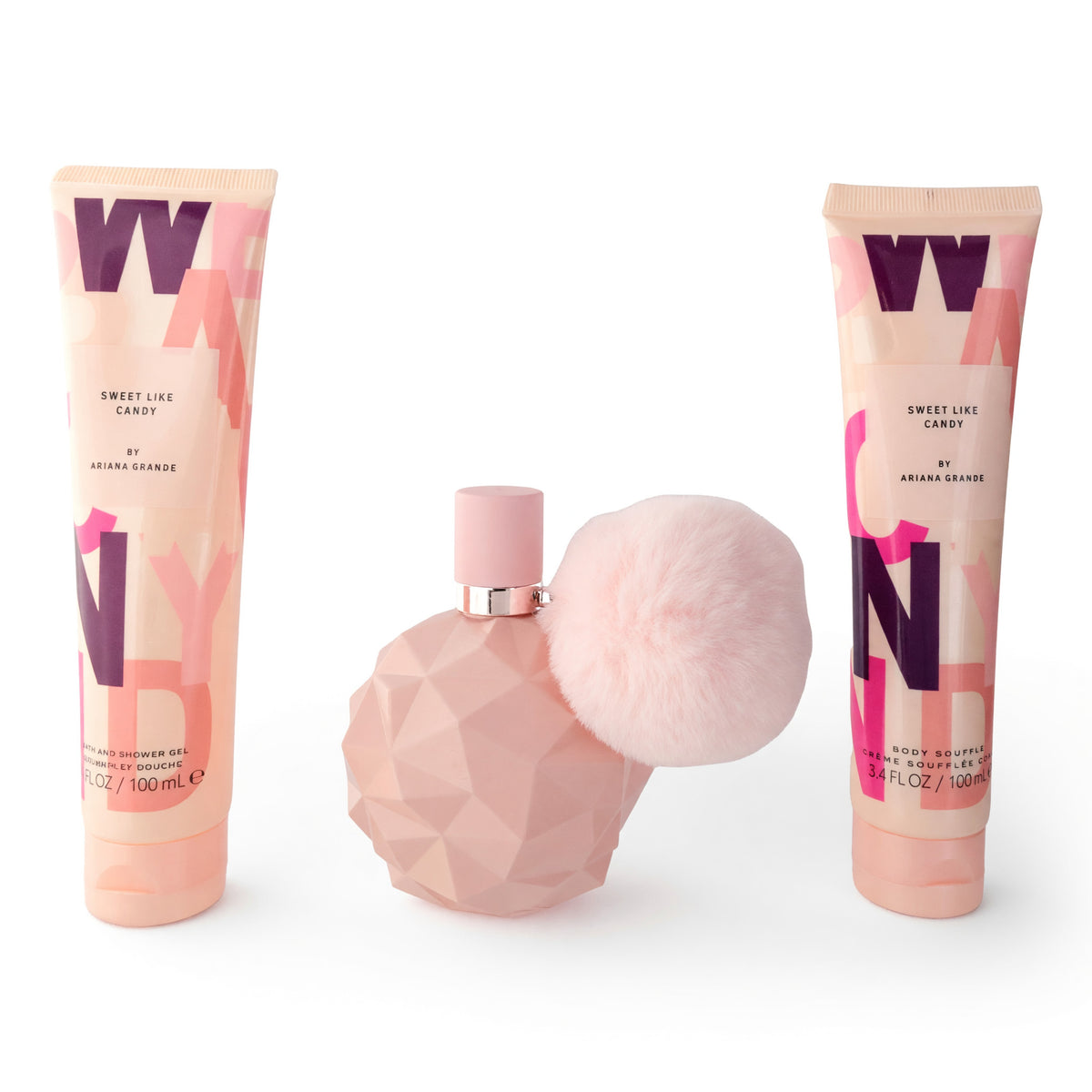 Women’s eau de parfum gift set with pink bottle and fluffy cap, plus two matching spray tubes