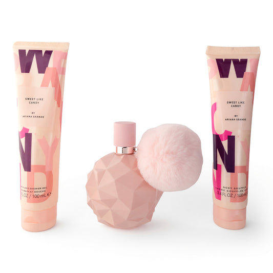 Women’s eau de parfum gift set with pink bottle and fluffy cap, plus two matching spray tubes