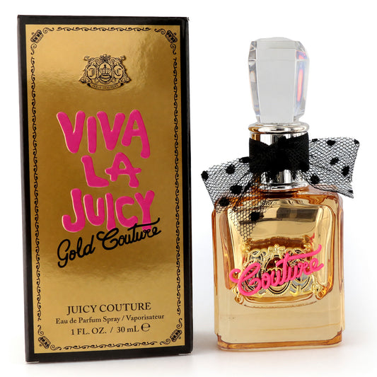 Gold perfume bottle with black cap and polka-dot tulle bow, in gold liquid