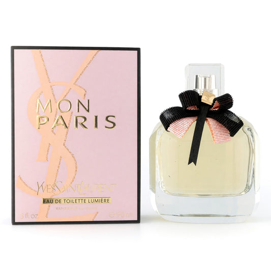 Women’s eau de toilette spray bottle with black bow and Mon Paris gift box
