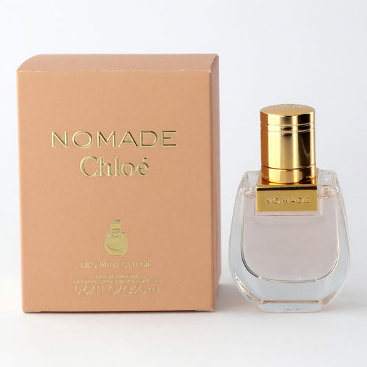 Nomade Les Mini by Chole eau de parfum: clear glass bottle with gold cap and box