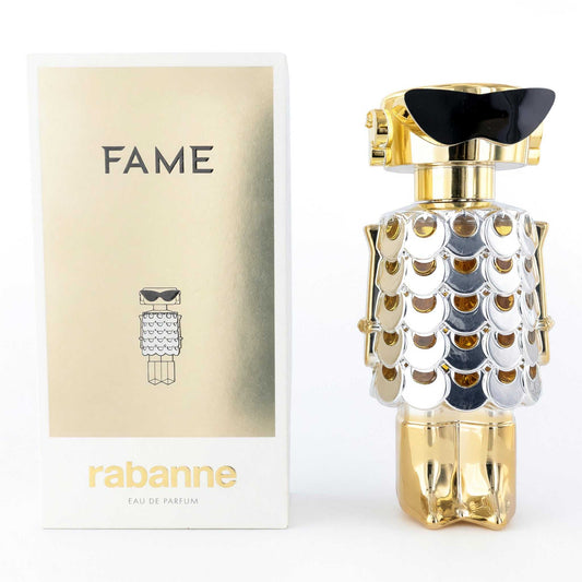Fame by Paco Rabanne women's EDP perfume bottle with gold cap and decorative glass