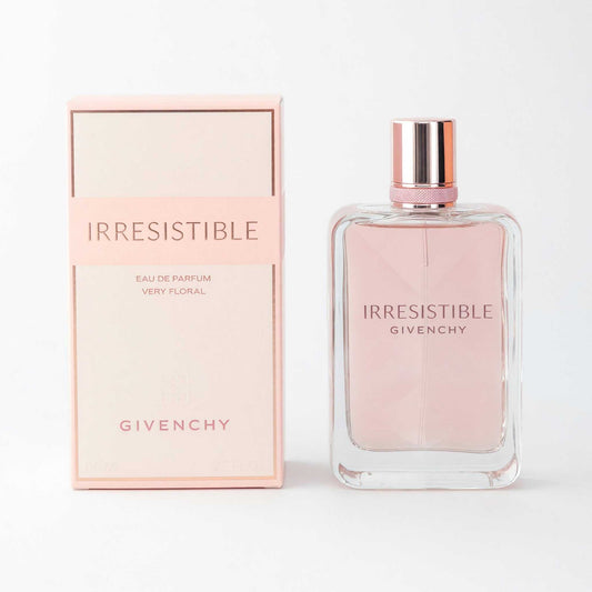 Givenchy Irresistible women's floral eau de parfum spray set: pink glass bottle, cap, box