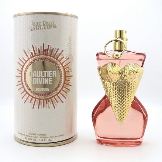Refillable perfume spray bottle with pink glass and gold heart-style stopper, with can