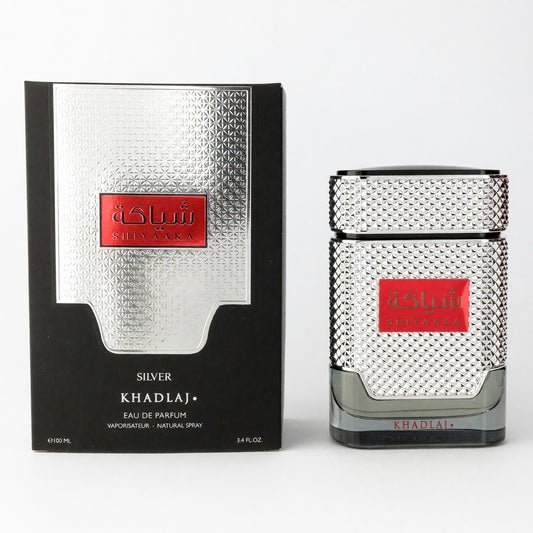 Silver men's EDP spray bottle with textured cap and matching box