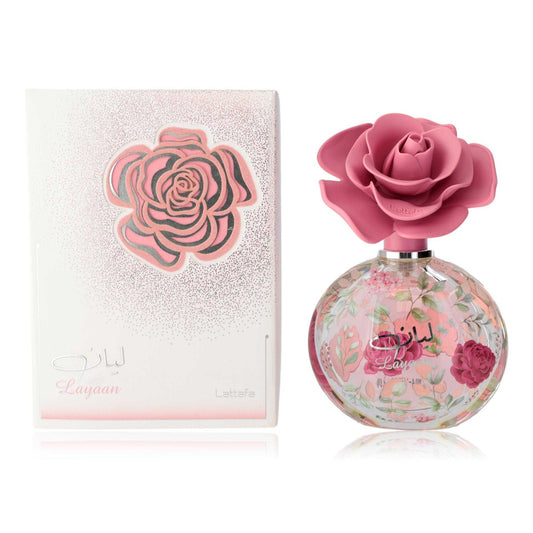 Women's floral EDP spray bottle with pink rose cap and matching decorative box