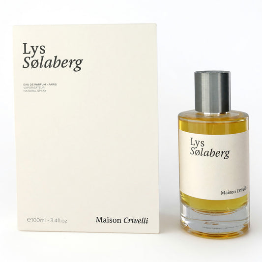 Glass EDP spray bottle with gold liquid and silver cap, with beige Maison Crivelli box