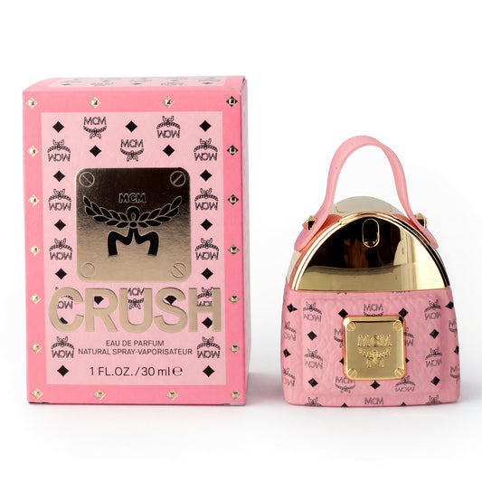 MCM Crush women’s eau de parfum spray in pink logo print box and handbag-shaped bottle