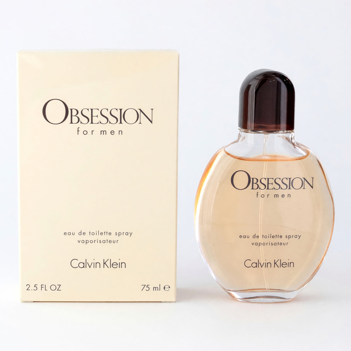 Men's Calvin Klein Obsession eau de toilette spray in glass bottle with amber cap