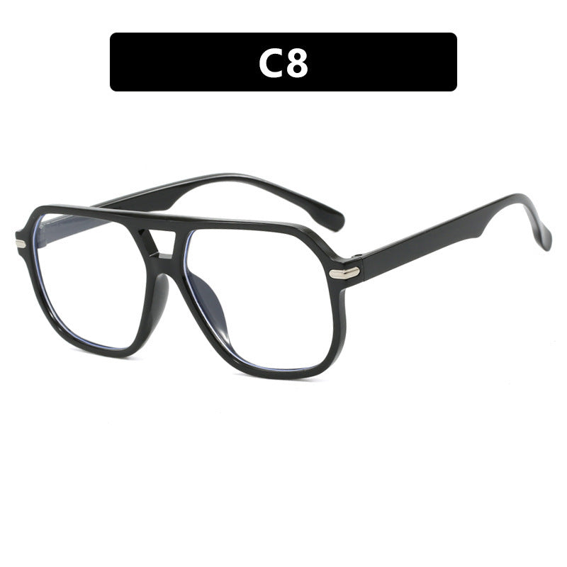 Women’s black square sunglasses with clear lenses and metal bridge detail