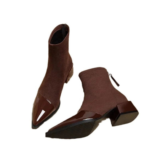 Brown ankle boots with pointed toe and chunky block heel, glossy side panels.