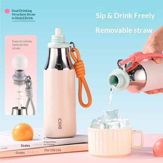 Insulated thermos mug with orange carry cord and matching straw, 540 ml capacity.