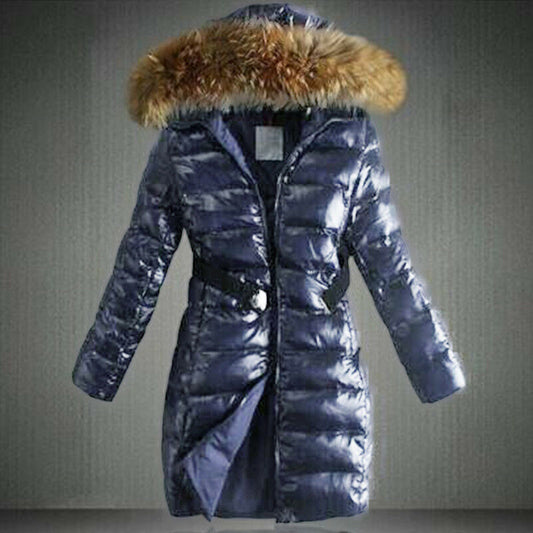 A mid-length women's down jacket in royal blue with a hood featuring a fur collar, displayed against a neutral background.