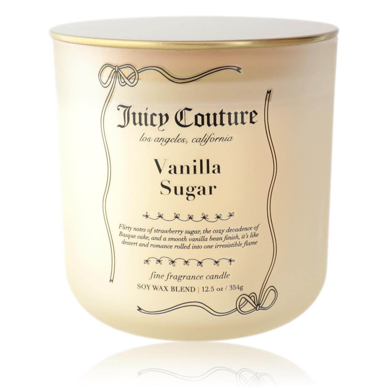 Juicy Couture Vanilla Sugar scented candle in cream glass jar with gold lid