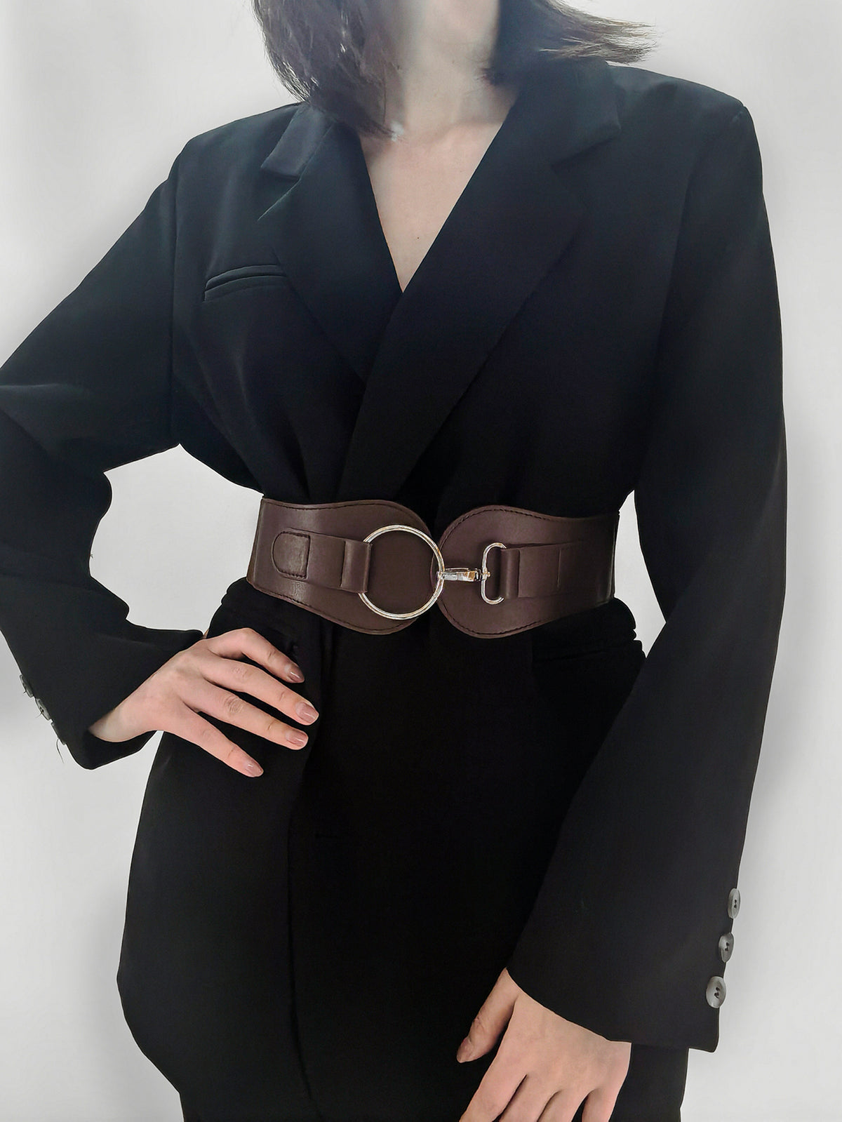 Wide PU elastic belt in dark brown, oval ring buckle centered on the waist